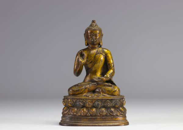 Gilded bronze Buddha probably from the Ming period - with a mark on the back