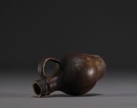 Raeren - Stoneware miniature jug with face decoration, 16th century.