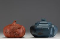 China - Set of two Yixing clay teapots.