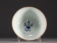 China - Large porcelain bowl decorated with lions in cartouche and flowers, Ming mark.