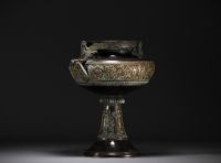 Bronze bowl on foot with Etruscan motifs, late 19th century.