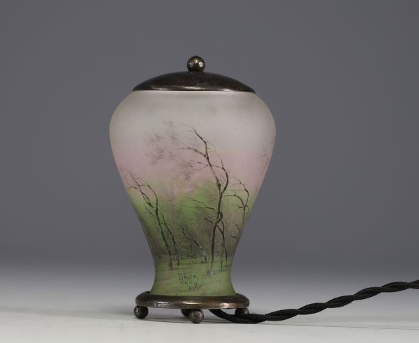 DAUM Nancy - Enamelled glass night-light decorated with a forest in the rain and wind, metal structure, signed in the decoration.