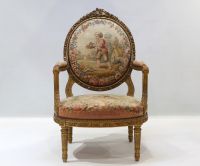 Important ensemble de mobilier de salon en bois sculpté et doré, tapisserie fine d'Aubusson comprenant un canapé et une suite de quatre fauteuils bergères, XIXème.