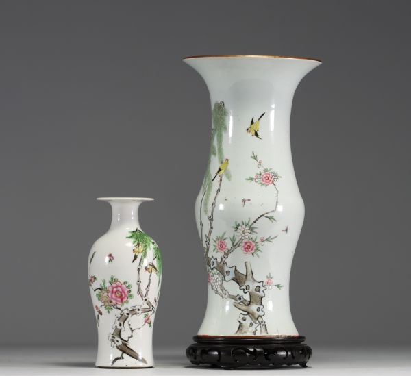 China - Set of two polychrome porcelain vases decorated with birds, circa 1900.