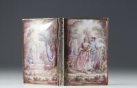 Ball book in enamelled porcelain and silver decorated with a romantic scene, Viennese work.