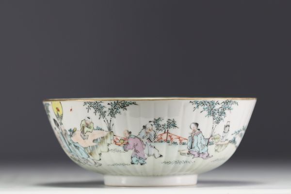 China - Large famille rose porcelain bowl decorated with figures.