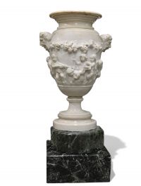 Imposing Carrara marble urn decorated with Satyrs and Putti in the Clodion style, first half of the 18th century.