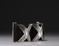 Hector AGUILAR (attributed to) - Modernist silver and leather bracelet.