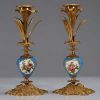 Pair of porcelain and gilt bronze candlesticks