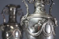 Imposing pair of Louis XVI chased and repoussé silver vases, hallmarks of Paris, 18th century.