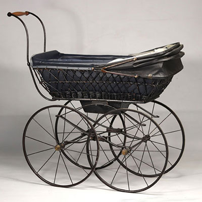 Doll's wicker and wrought iron pram, early 20th century.