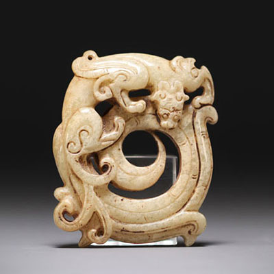 China - White jade pendant representing a phoenix.