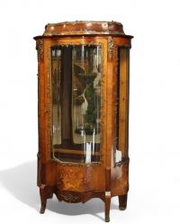 Louis XV style curved display cabinet in veneered wood and bronze, late 19th century, early 20th century.