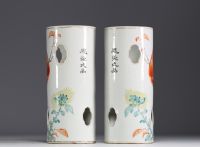 China - Pair of hat-holders decorated with a bird and a poem.