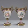 Pair of porcelain vases, gilt bronze mounting, in the Sèvres style.