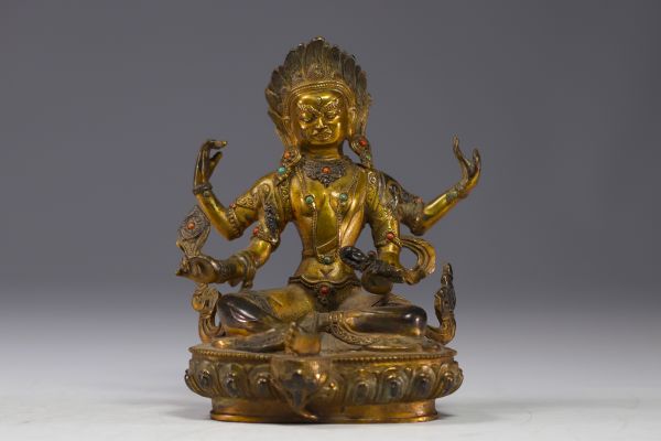 Chine, Tibet - Sculpture en bronze doré avec incrustations de pierres.